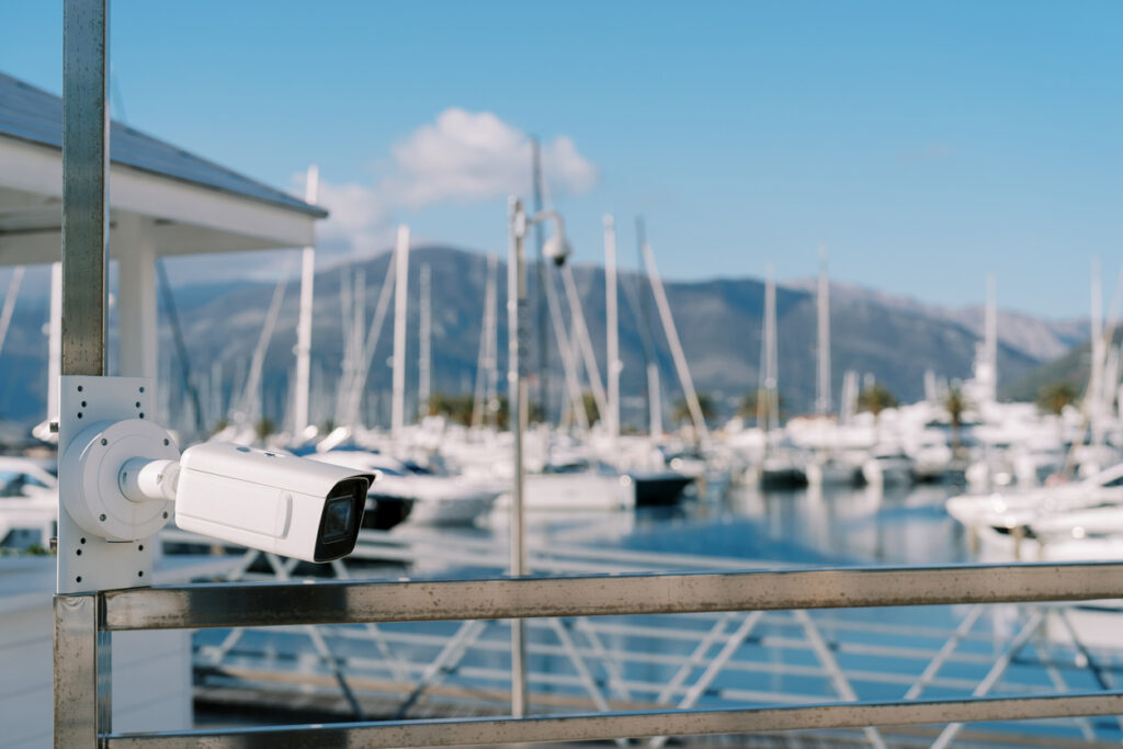 Security camera on the shore of the marina